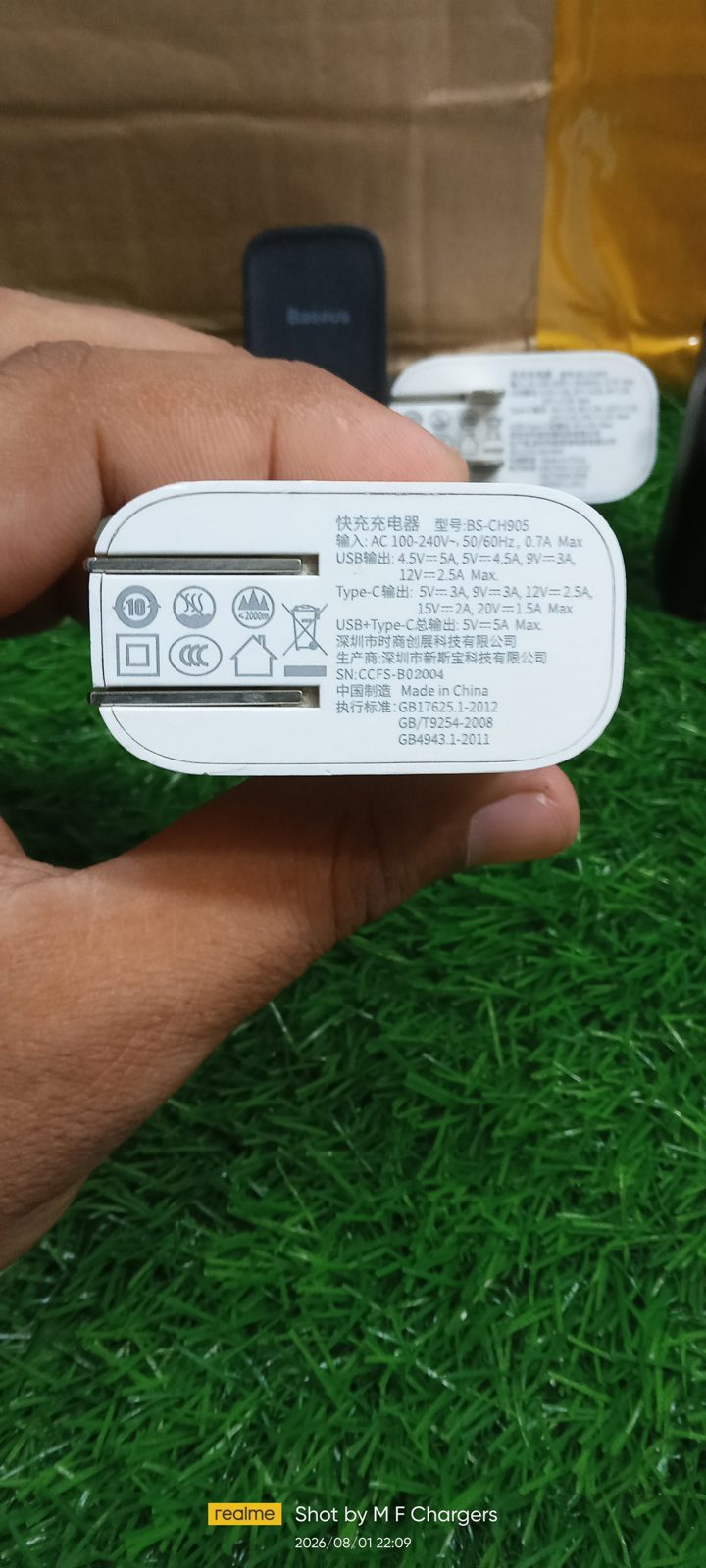 ​Detailed label showing specifications and power ratings of the authentic Baseus 30W charger, guaranteed genuine by M F Chargers.