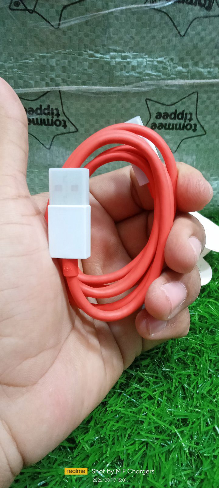 OnePlus Original Red Fast Charging Cable Held in Hand - M F Chargers