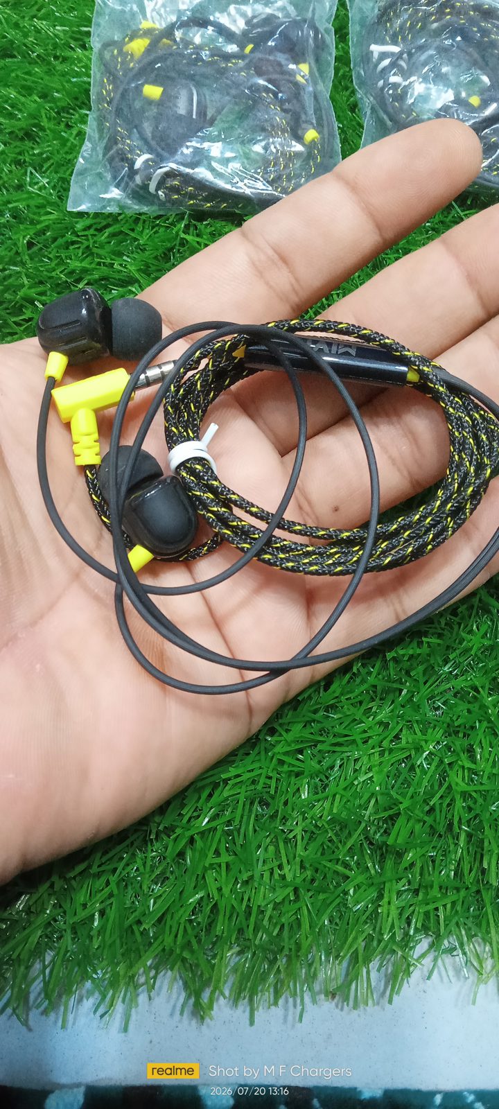 VIP MIVI Braided Earphones durable yellow black braided cable held in hand by M F Chargers
