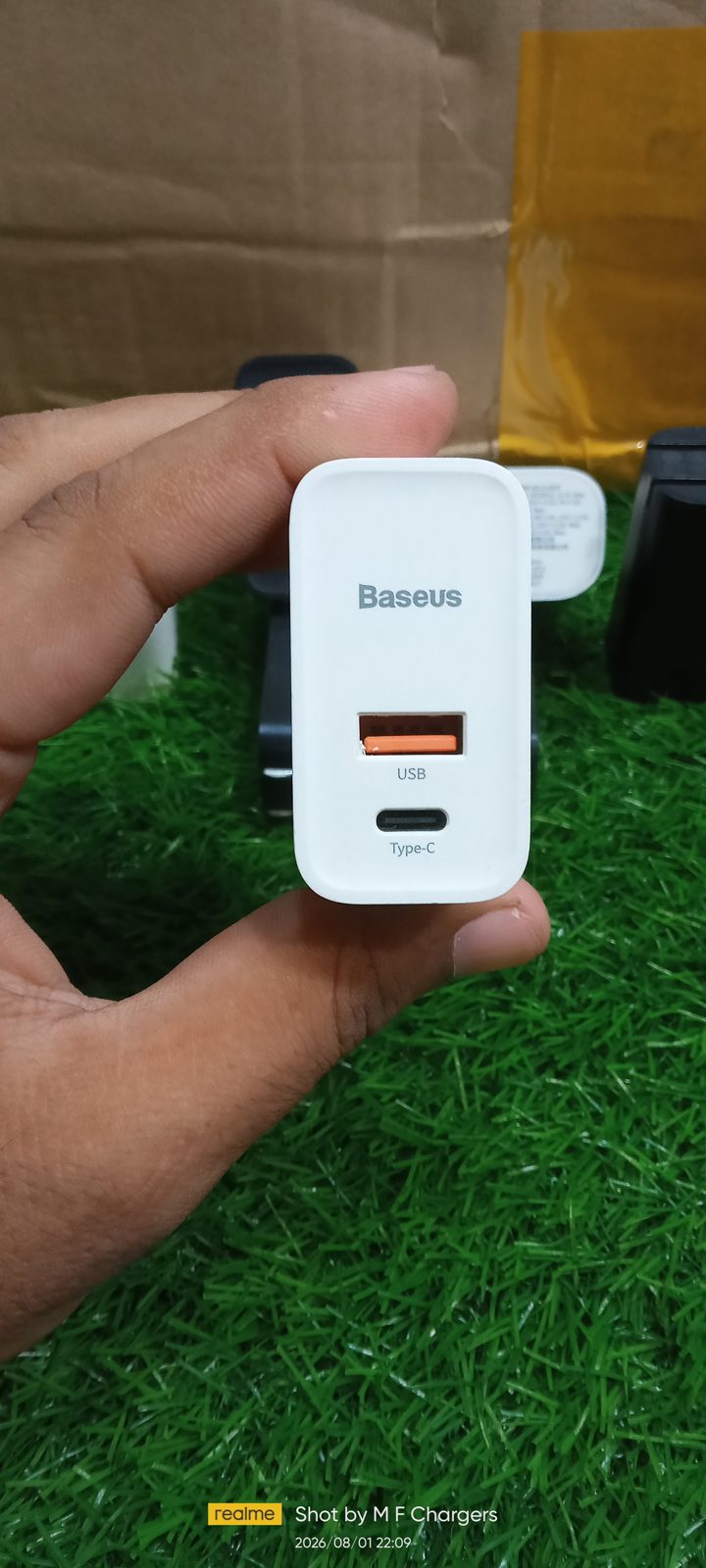 Front view of the genuine Baseus 30W dual port wall charger showing Type-C and USB-A ports, sold by M F Chargers.