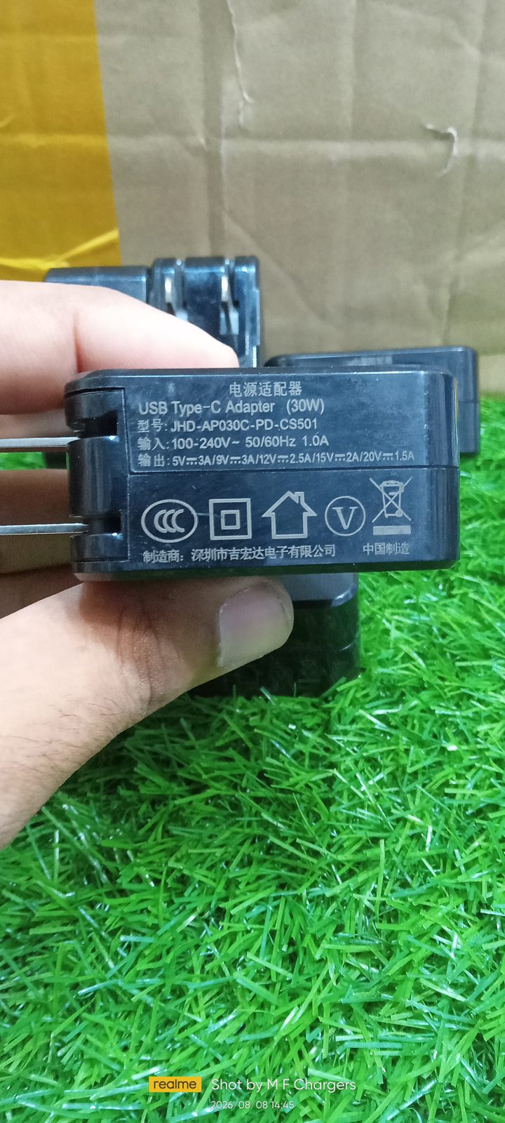 M F Chargers back view showing technical input and output specifications of the 30W adapter.