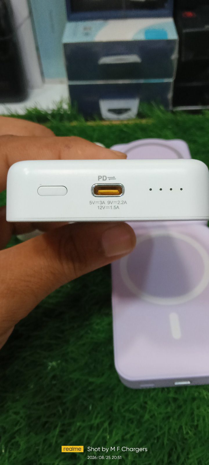 ​Bottom view of magnetic power bank showing USB-C port and LED indicators M F Chargers