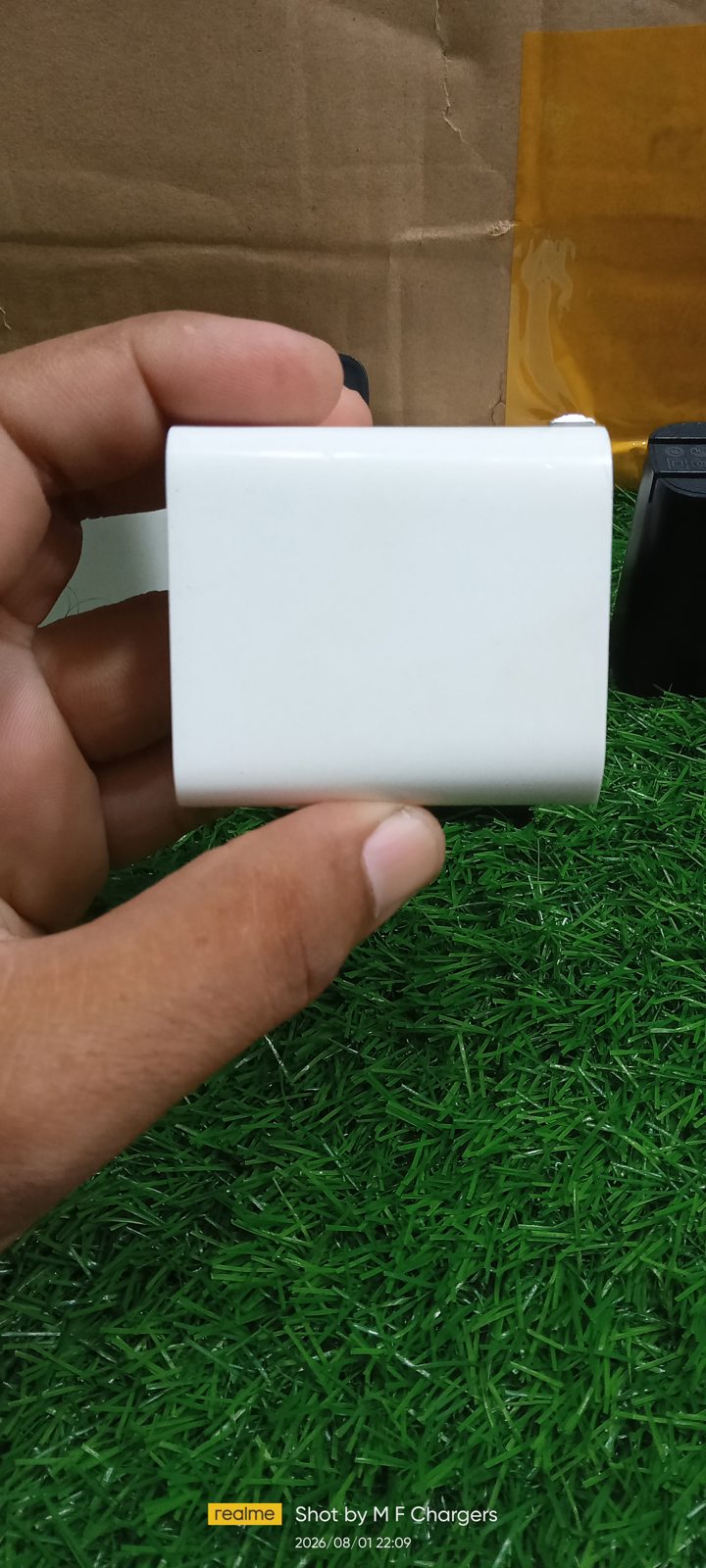 Side view showing the compact white design and sleek finish of the original Baseus 30W charger from M F Chargers.