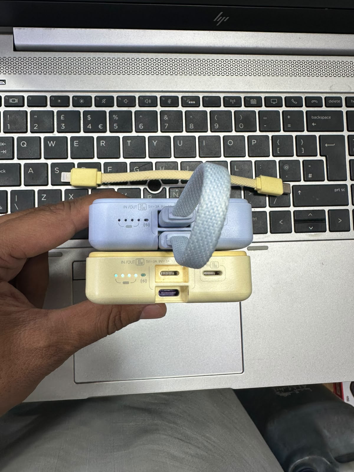 Romoss 30W power bank ports and built-in cables detail - M F Chargers