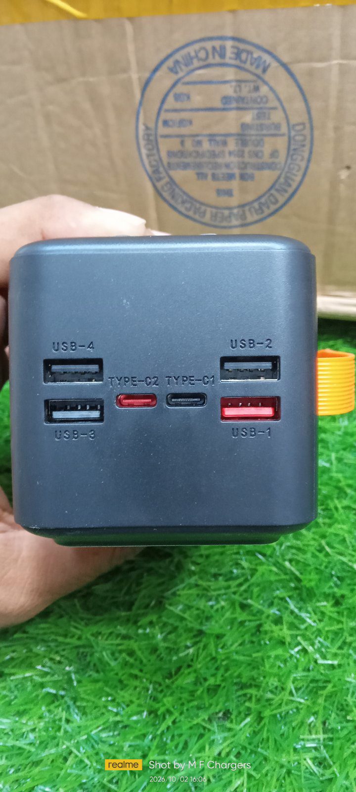 Power bank ports and USB charging slots close-up view - M F Chargers