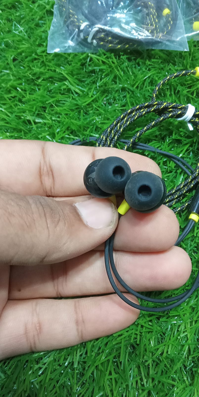 VIP MIVI Braided Earphones soft silicon ear tips front view held in hand at M F Chargers