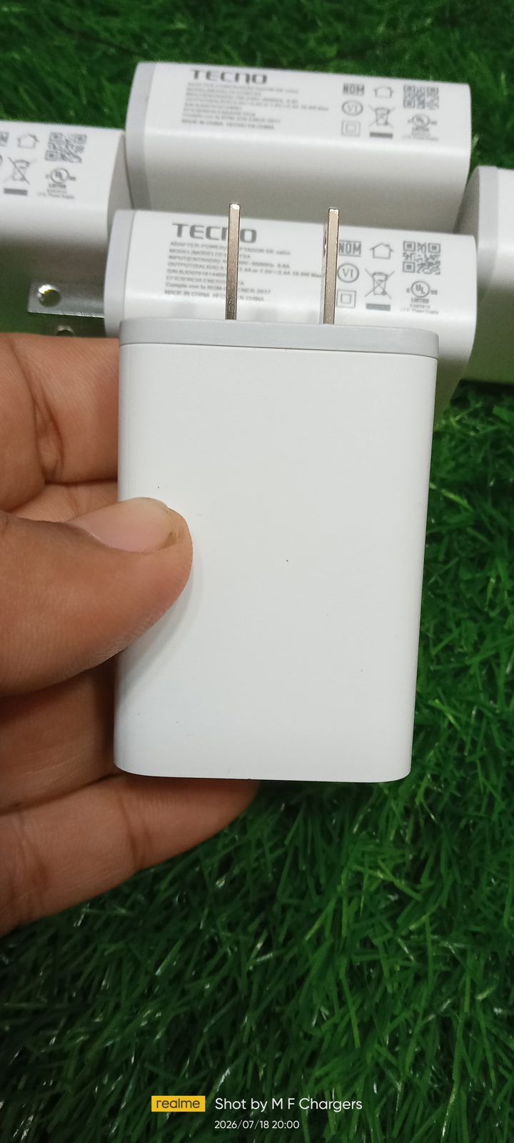 Tecno 18W fast charging adapter clean side white body view stock at M F Chargers