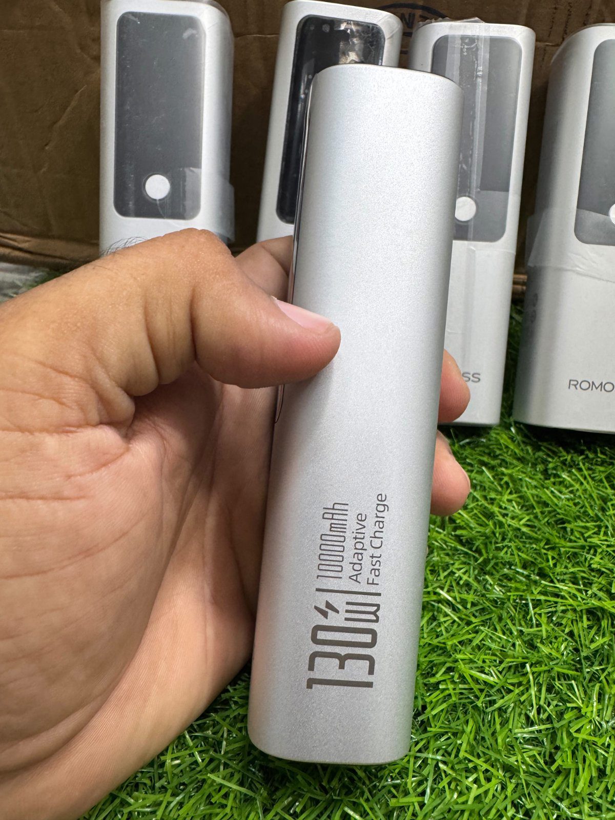 Romoss power bank side view showing 130W fast charging branding - M F Chargers
