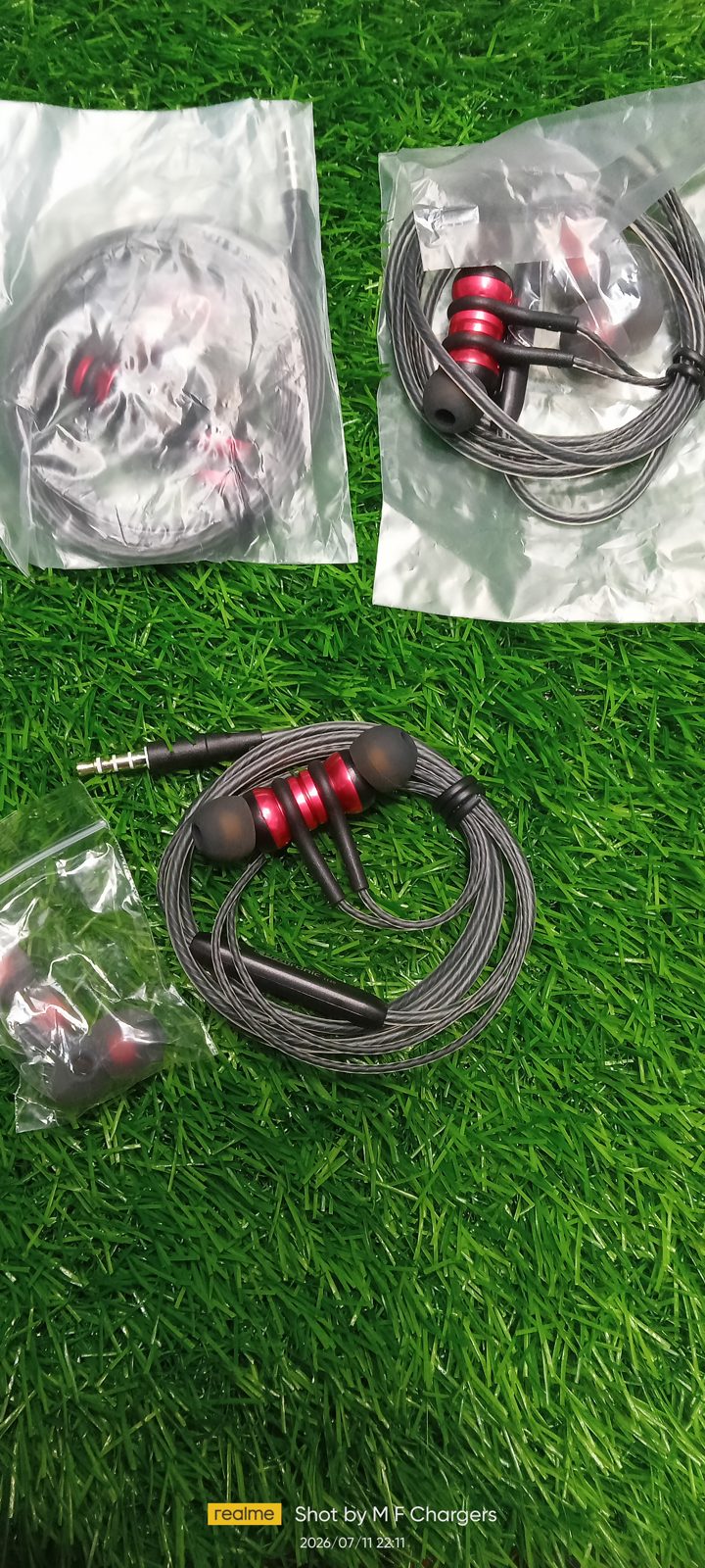​Original Protronic i120 premium wired earphones on green grass background by M F Chargers