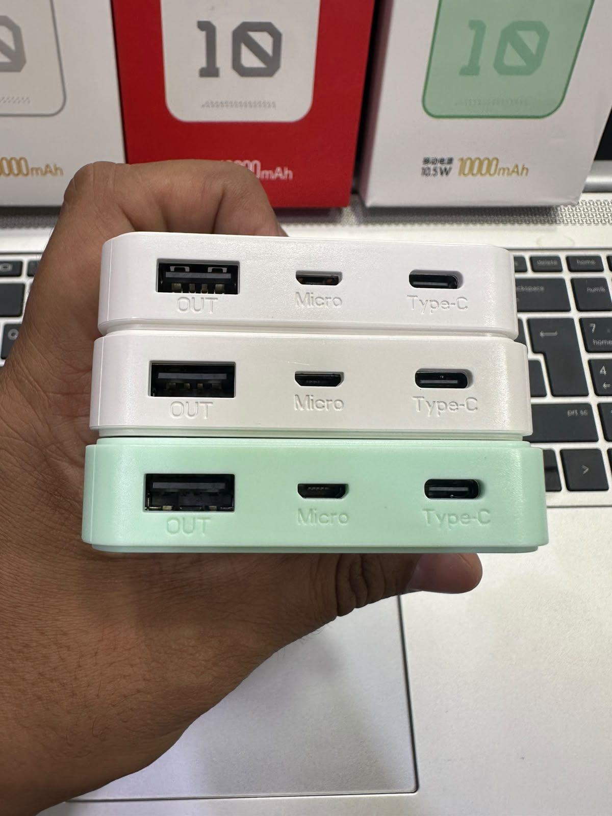 Close up view of USB-A, Micro-USB, and Type-C charging ports on Yevon power bank M F Chargers